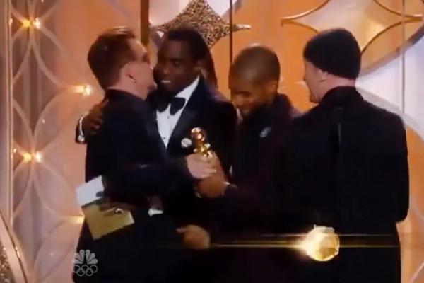 Momen Canggung di Panggung Golden Globe, Vokalis U2 Bono Tolak Ciuman Sean Diddy Combs