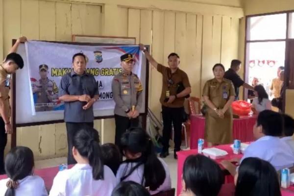 Kapolres Bolmong Bagikan Makanan Bergizi Gratis Kepada Siswa SD